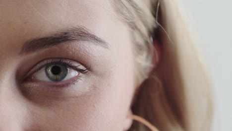 close-up-woman-blue-eye-looking-at-camera-expression-wearing-makeup-cosmetics-optical-health