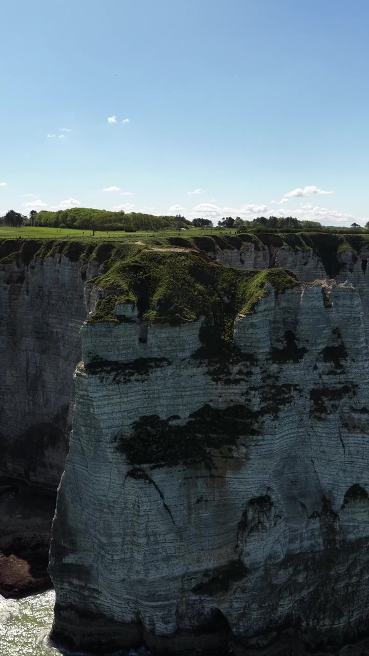 Falaise d'Amont arch Cliffs of Étretat Alabaster Coast Normandy France vertical video reel
