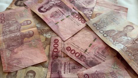 thailand thai baht money cash currency notes and bills ฿ thb