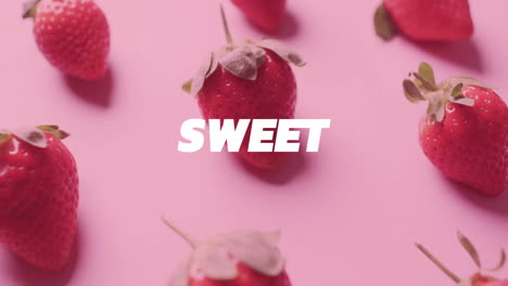 animation of sweet text over strawberries on pink background