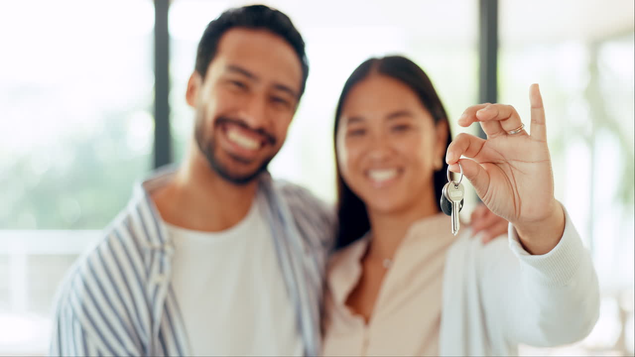 Keys, home and couple excited