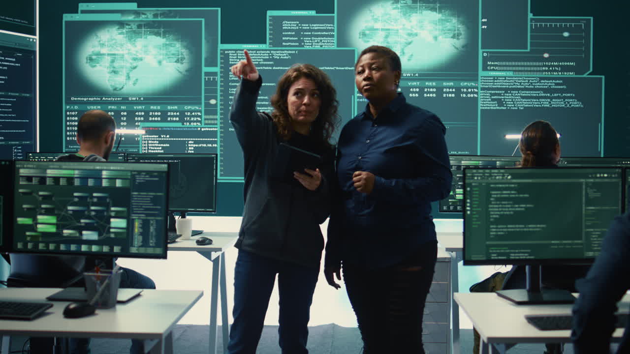 Cyber security experts women working on spyware and malware detection