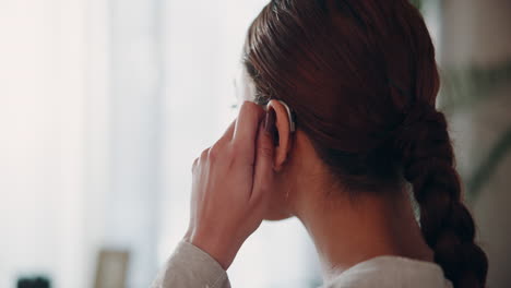 woman with a hearing aid