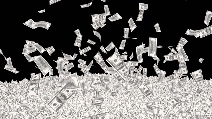 Dollar bills are falling isolated on a dark loop background a blank for using money concepts for