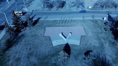 Edmonton-Victoria-Cross-Memorial-Park-aerial-birds-eye-top-view-overlooking-iconic-V-shaped-structure-listing-off-all-the-people-who-serve-in-world-war-one-and-two-in-Alberta-Canada-open-to-the-public