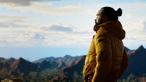 young traveler enjoys the serenity of the high altitude wilderness