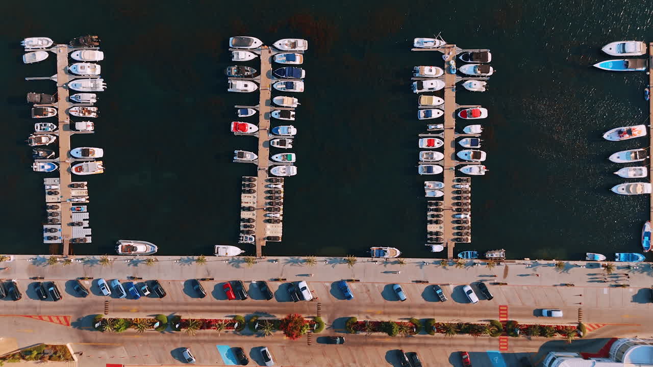 Berths with multiple yachts and jet ski scooters. Top view on the sea shore of Sveti Vlas, Bulgaria