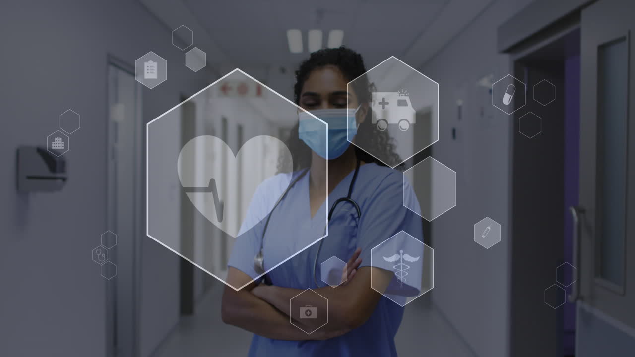 Animazione di icone mediche ed elaborazione dati su una dottoressa birazziale con mascherina