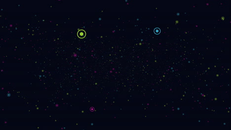 floating rainbow dots on dark background