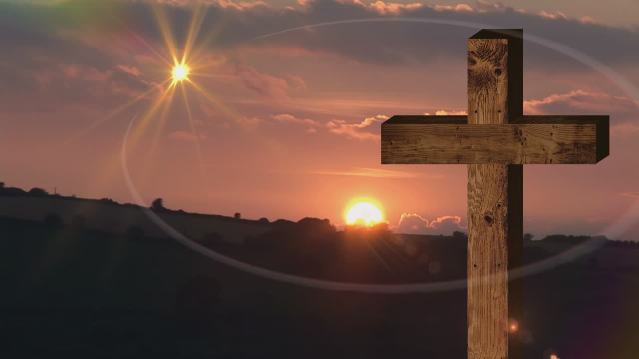 해가 지는 풍경 위에 십자가와 움직이는 빛의 애니메이션