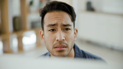 man looking at computer