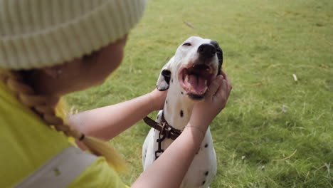 woman petting a dog