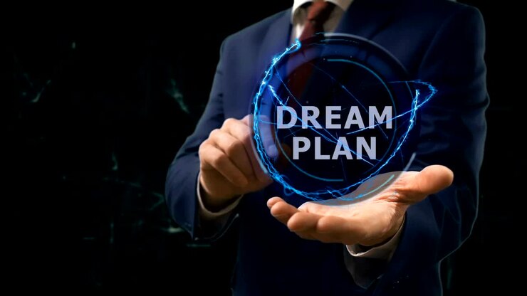 Businessman shows concept hologram Dream plan on his hand