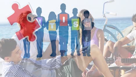 Animation-of-colourful-puzzle-pieces-and-autism-text-over-happy-friends-at-summer-beach-party