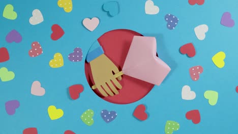 el giro del fondo del día de san valentín. fondo de valentín abstracto de vacaciones con corazones de papel multicolores. imágenes de video en 4k. concepto de amor