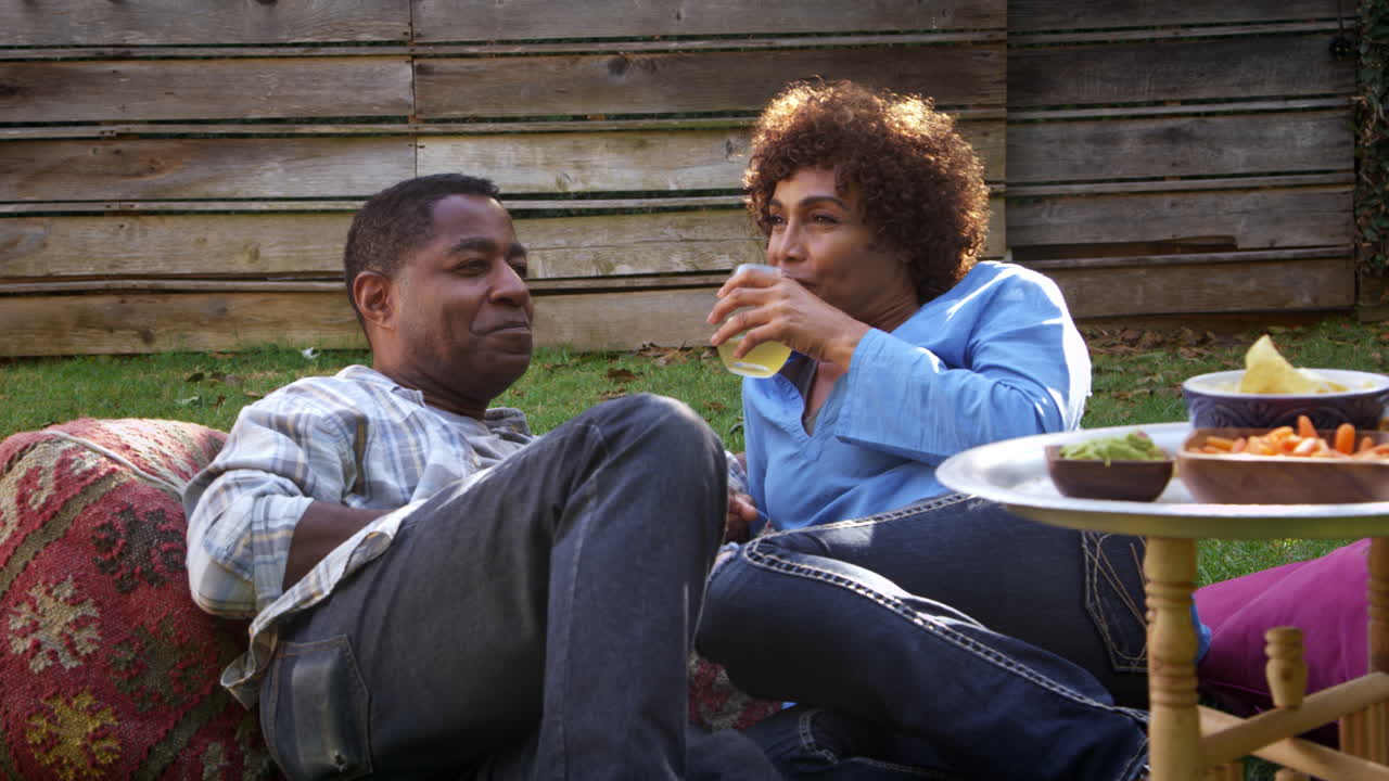 Mature Couple Relax In Garden Together Shot On R3D