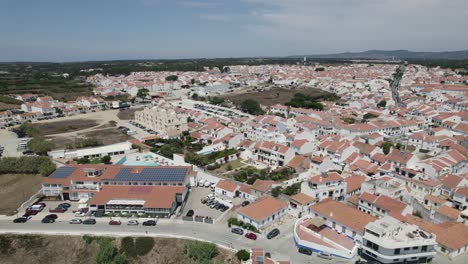 aerial backwards view of vila nova de milfontes in its extension