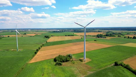 Aerial-view-of-powerful-Wind-turbine-farm-for-energy-production-on-beautiful-cloudy-sky-at-highland