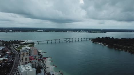 causeway bridge, clearwater, florida, hotels rain clouds aerial, backward