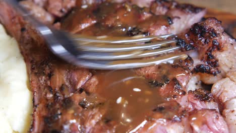 grilled steak with mashed potatoes and gravy