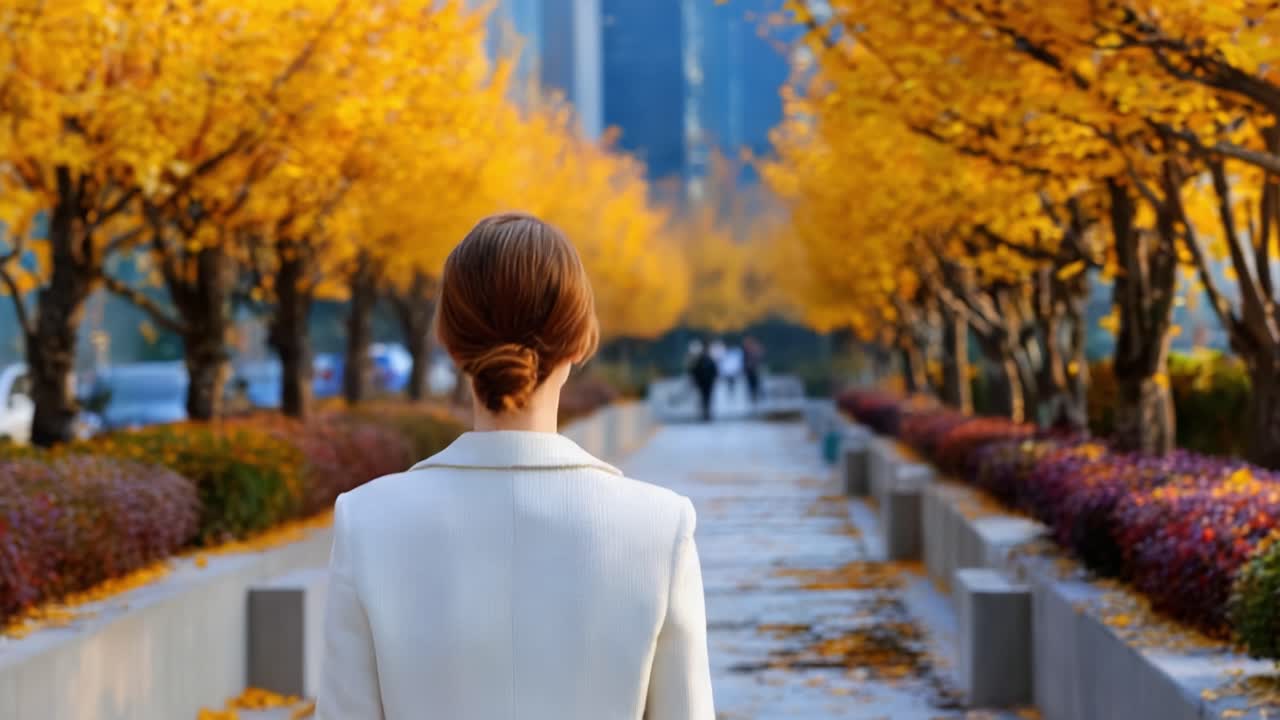 A Serene Walk Through a Golden Row of Autumn Trees: Embracing Nature's Beauty and Tranquility in a City Oasis