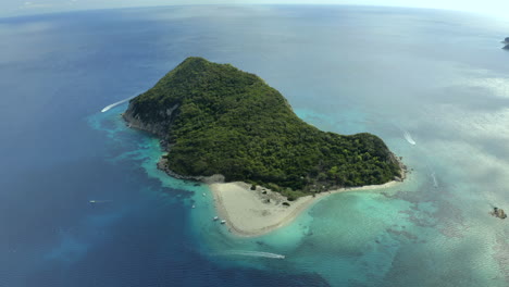 smooth-drone-shot-of-the-whole-island-of-marathonisi,-in-Zakynthos,-Greece