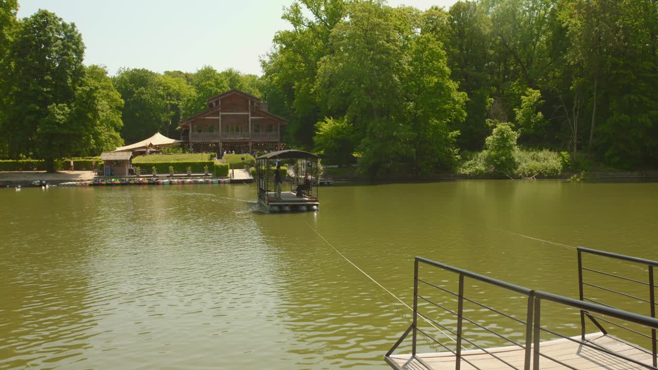 Boat Across The Waters Leading To Chalet Robinson In Bois de la Cambre, Robinson Island In Brussels, Belgium