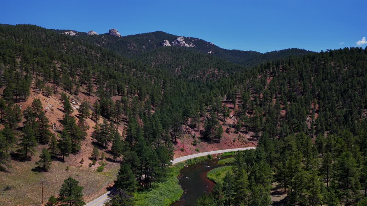Summer Deckers South Platte River Conifer Pine aerial drone Colorado Trail Foxton North Fork Buffalo Creek Platte Canyon morning sunny blue sky Pike National Forest windy road forward