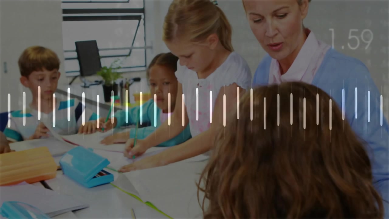 Girl in wheelchair tapping tablet accessing waveform, teacher guiding students writing for learning