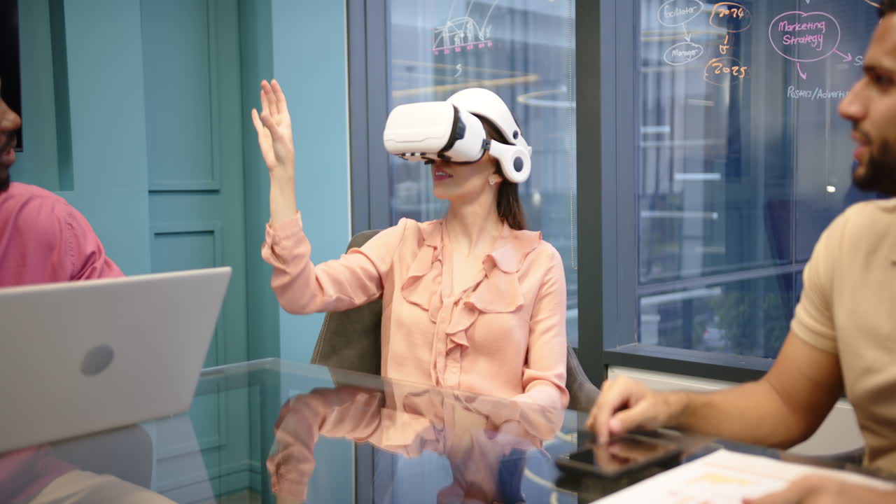 Using VR headset, woman interacting with virtual environment in office meeting