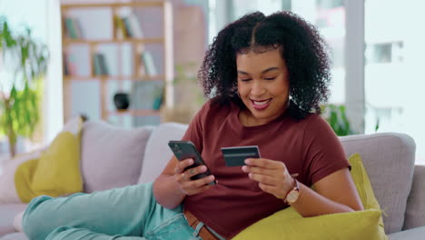 Phone,-sofa-and-woman-with-credit-card-for-online