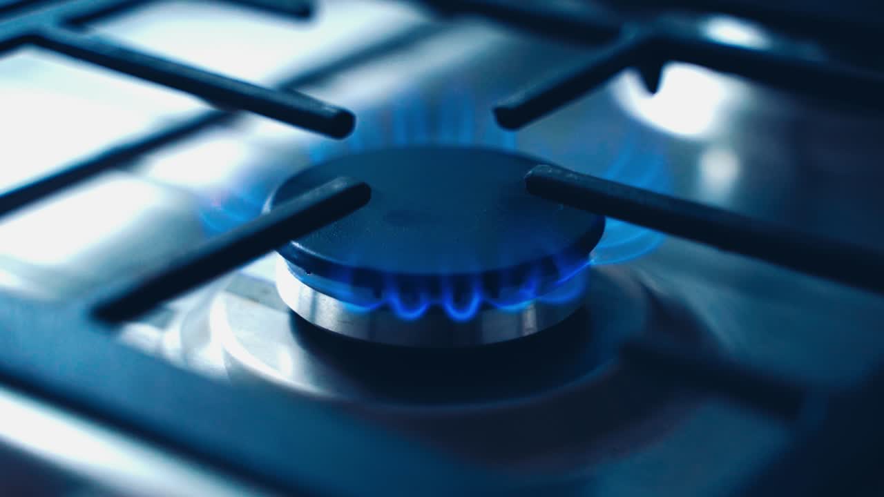 Burning blue flame of gas. Gas burning from kitchen gas stove
