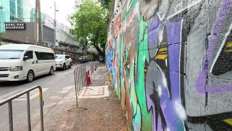 graffiti-covered alleyway in bangkok