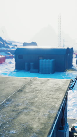 frozen industrial facility in a cold, snowy landscape