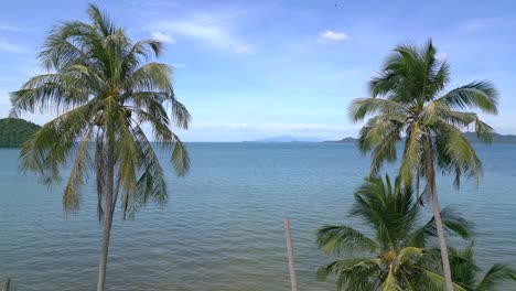 Smooth-aerial-view-flight-natural-sand-beach-Koh-chang-island-Thailand-sunny-day-2022