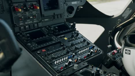 control panel inside helicopter cockpit - dolly shot