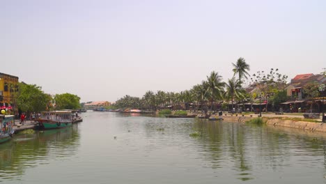 River-running-through-Hoi-An,-Vietnam-during-day-time