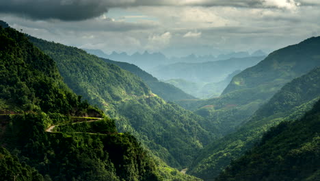 time lapse view of clouds moving over dramatic thai an road mountain pass