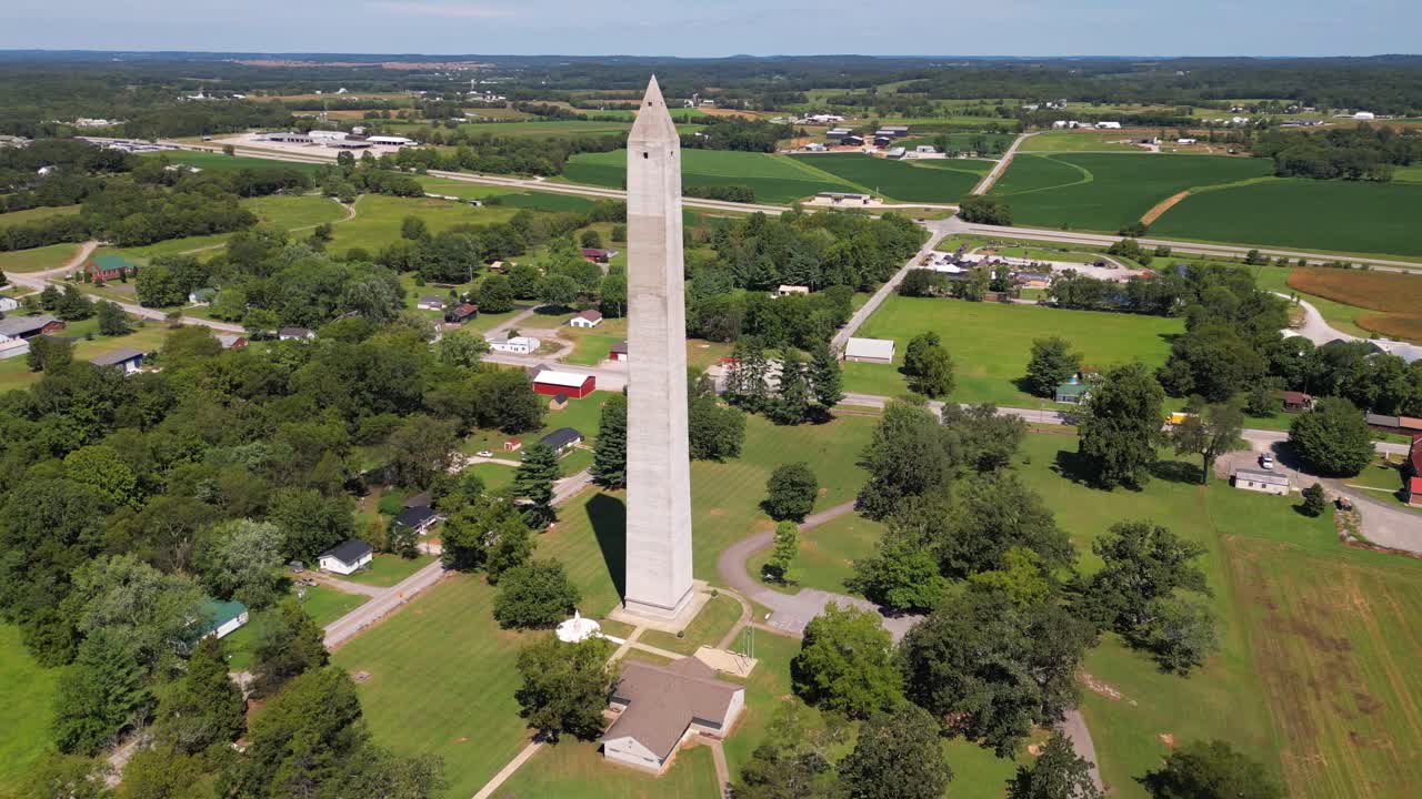 Aerial 4k orbit of the Jefferson Davis Monument, displaying the surrounding area