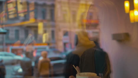 Woman-and-man-talk-drinking-coffee-in-the-restaurat