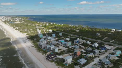 Drone-shot-of-shadows-passing-over-Cape-San-Blas,-Florida