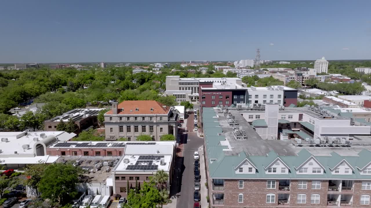 Gainesville, Florida downtown with drone video moving in low.