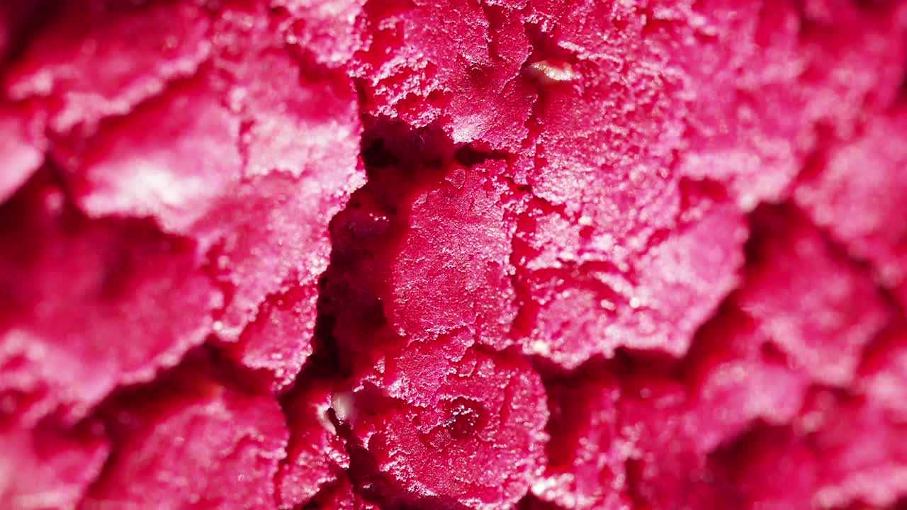 Close-up of Vibrant Pink Textured Frozen Dessert