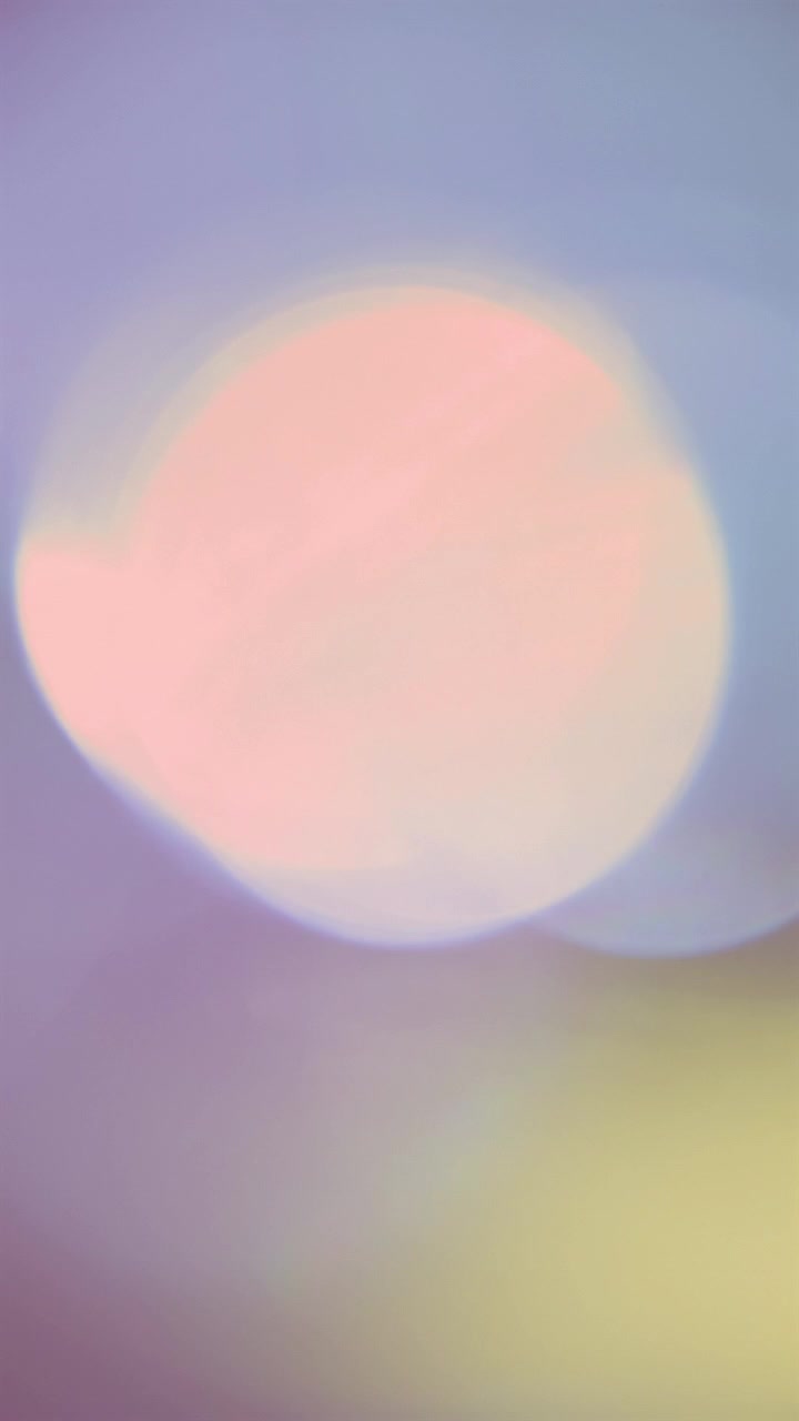 Sfondo Astratto con Bokeh Cangiante Colorato e Sfumatura di Luce
