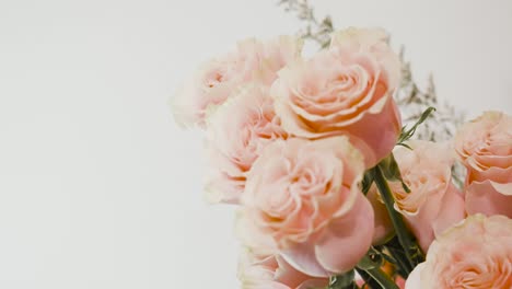 Close-up-shot-of-lovely-pink-roses-inside-a-Valentine's-day-Bouquet