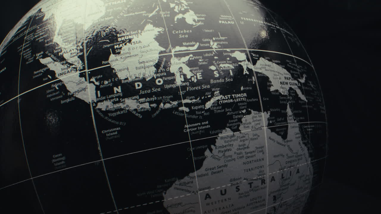 Close-up of a black and white world globe
