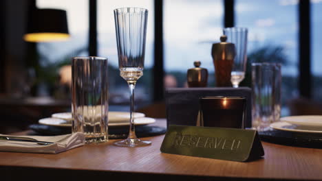 cutlery on reserved table in luxury restaurant without people. dinner concept.