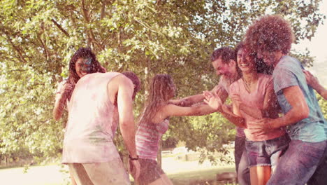 In-slow-motion-happy-friends-covered-in-powder-paint-