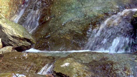 natural stream finds its way over a rocky surface