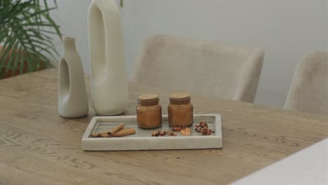 dining table decor with candles and vases